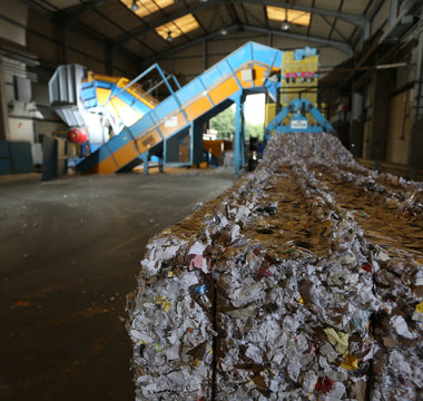 paper waste being disposed