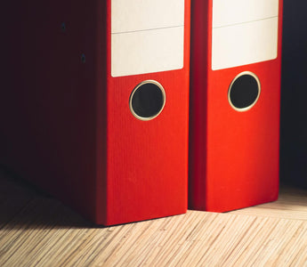 Two red file boxes.