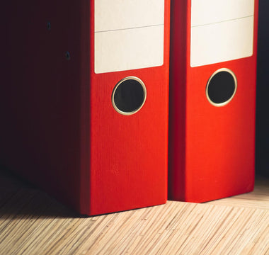 Two red file boxes.