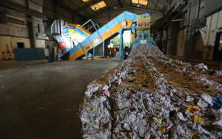 paper waste being disposed